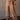 High rise flowy pants with filigree print, thick elastic waistband with drawstring, long lined silhouette.