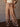 High rise flowy pants with filigree print, thick elastic waistband with drawstring, long lined silhouette.
